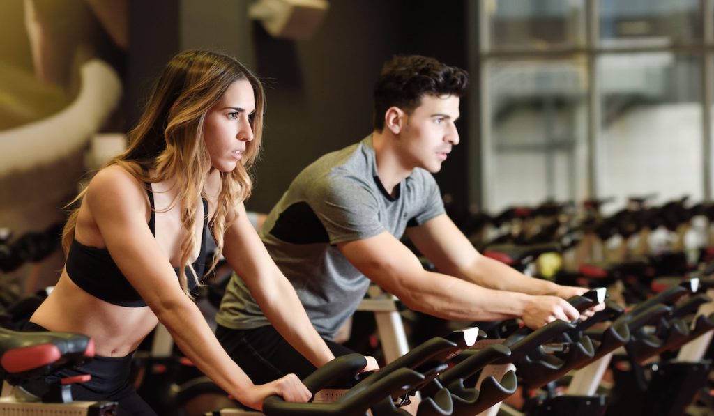 couple doing spin class