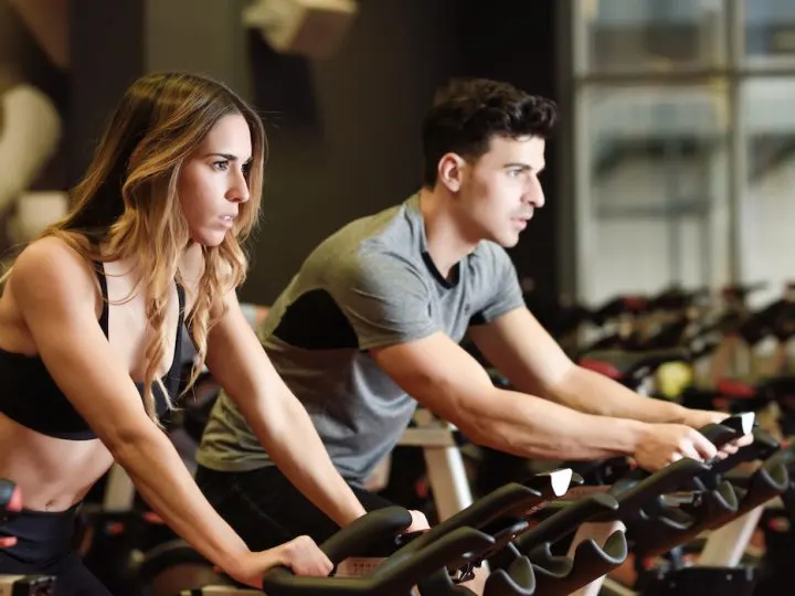 couple doing spin class