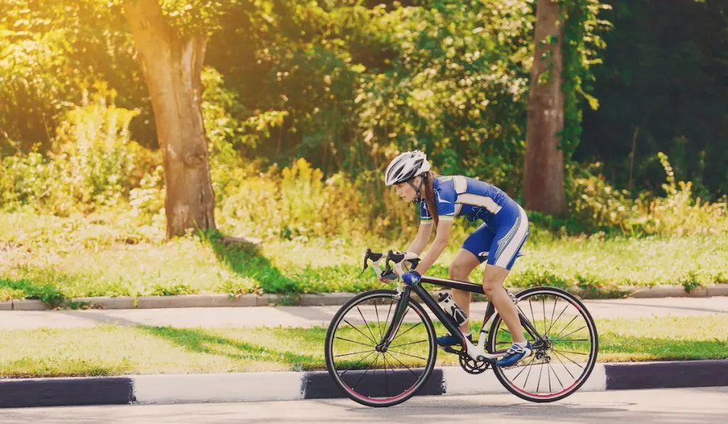 female cyclist alone in a triathlon