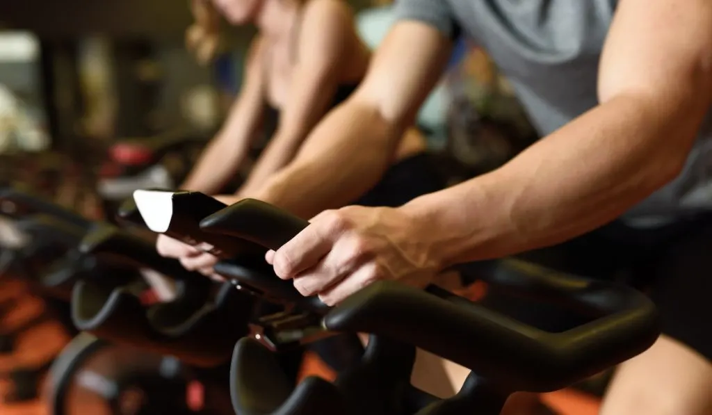 holding a handle for a spin class