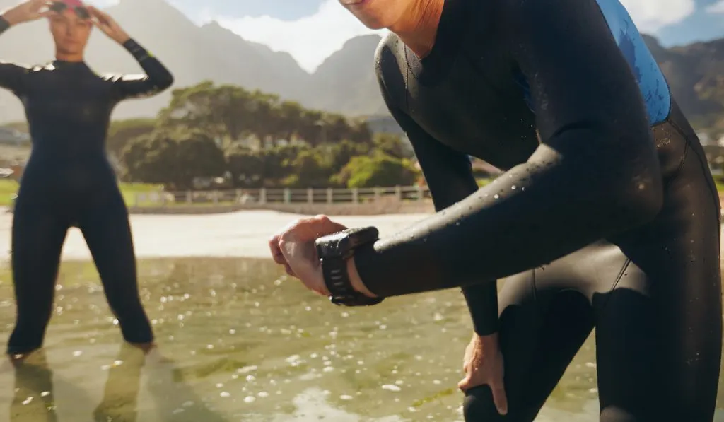 triathletes wearing wet suit