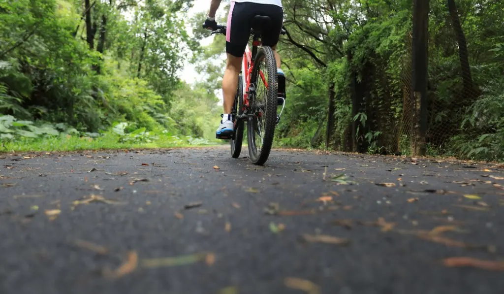 riding a mountain bike on road