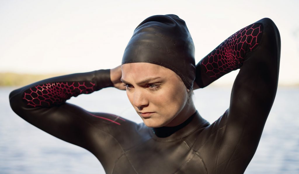 Female Swimmer Wearing Swimming Cap At Lakeshore