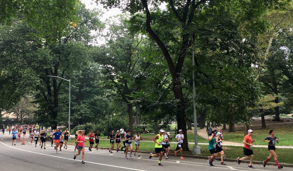 Marathon runners passing through Central Park New York -