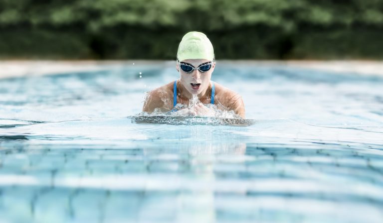 how to swim breaststroke with head above water