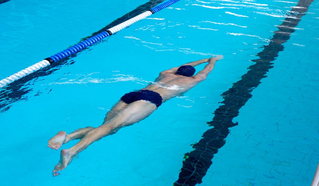 athlete swimmer gliding in the pool